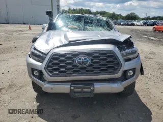2020 Toyota Tacoma SR5 with VIN 3TMDZ5BN5LM090020, listed as a Copart auction lot 58192835 with 107,156 mi miles and Salvage title. Bid and sale history available at DreamBid. Image 5.