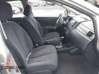 2007 Nissan Versa 1.8 SL with VIN 3N1BC11E97L447829, listed as a IAAI auction lot 41612386 with 123,500 mi miles. Bid and sale history available at carsss.com. Image 5.