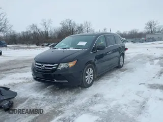 2015 Honda Odyssey EX-L with VIN 5FNRL5H60FB018030, listed as a IAAI auction lot 41608357 with 166,214 mi miles and . Bid and sale history available at carsss.com. Image 2.