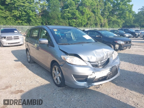 2010 Mazda 5 Sport with VIN JM1CR2W32A0385045, listed as a IAAI auction lot 42451448 with 127,762 mi miles and . Bid and sale history available at DreamBid. Image 1.