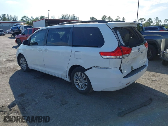 2012 Toyota Sienna XLE AAS with VIN 5TDYK3DC0CS254294, listed as a IAAI auction lot 41274822 with 135,135 mi miles and . Bid and sale history available at carsss.com. Image 3.