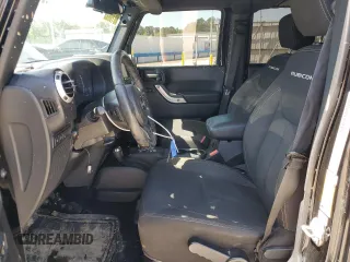 2016 Jeep Wrangler Unlimited Rubicon with VIN 1C4BJWFG5GL290757, listed as a Copart auction lot 52099225 with 102,424 mi miles and Salvage title. Bid and sale history available at DreamBid. Image 7.