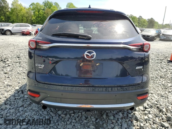 2016 Mazda CX-9 Grand Touring with VIN JM3TCBDY0G0116686, listed as a Copart auction lot 54077335 with 142,670 mi miles and Salvage title. Bid and sale history available at DreamBid. Image 6.