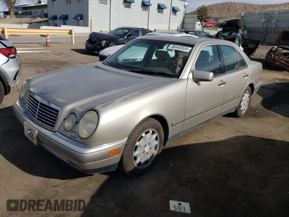1997 Mercedes-Benz E-Class with VIN WDBJF55F7VA412770, listed as a Copart auction lot 86442634 with 238,065 mi miles and Clean Title. Bid and sale history available at carsss.com. Image 1.