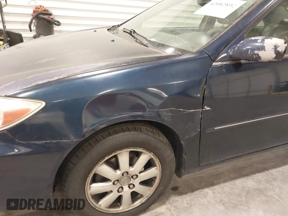 2003 Toyota Camry LE with VIN 4T1BE30K03U152348, listed as a IAAI auction lot 42082892 with 224,721 mi miles and . Bid and sale history available at DreamBid. Image 6.
