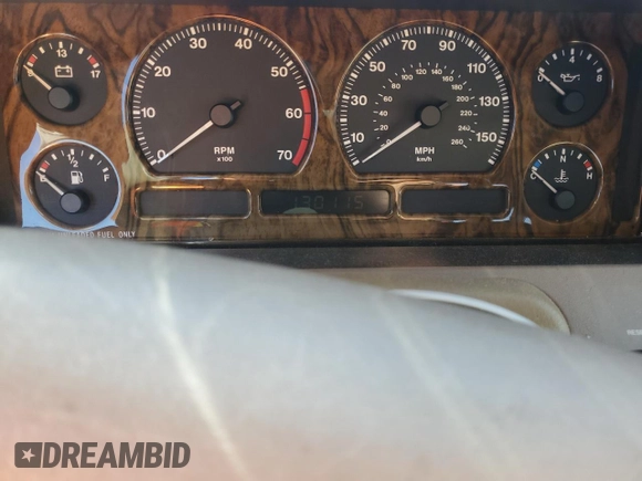 1995 Jaguar XJ with VIN SAJKX1743SC734007, listed as a Copart auction lot 46340825 with 130,115 mi miles and Salvage Title. Bid and sale history available at DreamBid. Image 9.