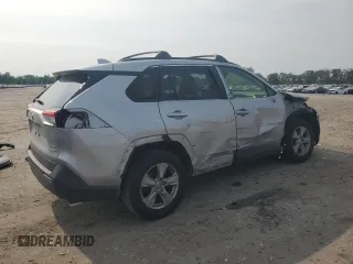 2023 Toyota RAV4 Hybrid XLE with VIN JTMRWRFV7PD166743, listed as a Copart auction lot 59964505 with 87,404 mi miles and Salvage title. Bid and sale history available at DreamBid. Image 3.