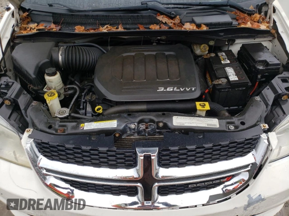 2012 Dodge Grand Caravan SE with VIN 2C4RDGBG8CR251423, listed as a Copart auction lot 85516014 with 119,149 mi miles and Clean Title. Bid and sale history available at DreamBid. Image 12.