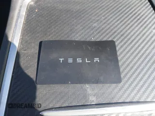 2023 Tesla Model Y Long Range with VIN 7SAYGDEE1PA060410, listed as a IAAI auction lot 41357943 with 19,072 mi miles. Bid and sale history available at carsss.com. Image 11.