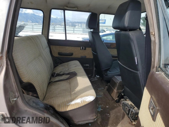 1985 Toyota Land Cruiser z VIN JT3FJ60G8F1127643, wystawiony jako Copart lot #46289955 z przebiegiem 276 869 mil mil oraz Czysty tytuł • Clean title. Historia ofert i sprzedaży dostępna na DreamBid. Obrazek 11.