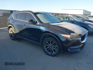 2019 Mazda CX-5 Signature with VIN JM3KFBEY5K0656965, listed as a IAAI auction lot 41421453 with 99,073 mi miles. Bid and sale history available at carsss.com. Image 1.