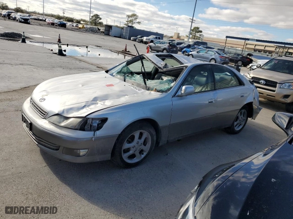 2001 Lexus ES 300 with VIN JT8BF28GX10327901, listed as a Copart auction lot 85946034 with 143,391 mi miles and Salvage Title. Bid and sale history available at carsss.com. Image 1.