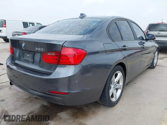 2013 BMW 3 Series 320i with VIN WBA3B1C53DK128602, listed as a IAAI auction lot 41952771 with 103,564 mi miles and . Bid and sale history available at carsss.com. Image 4.