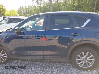 2023 Mazda CX-5 S Preferred with VIN JM3KFBCM1P0260992, listed as a IAAI auction lot 42192977 with 22,445 mi miles and . Bid and sale history available at carsss.com. Image 15.
