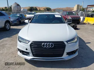 2016 Audi A7 Prestige with VIN WAU2GAFC9GN062082, listed as a IAAI auction lot 42711776 with 65,768 mi miles and . Bid and sale history available at DreamBid. Image 13.