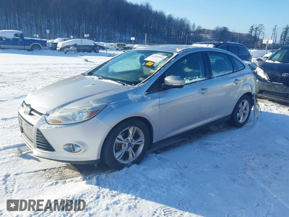 2012 Ford Focus SE with VIN 1FAHP3F27CL457213, listed as a IAAI auction lot 41303904 with 215,044 mi miles and . Bid and sale history available at DreamBid. Image 17.