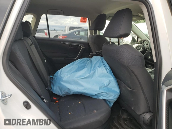 2023 Toyota RAV4 Hybrid LE with VIN JTMMWRFV3PD570648, listed as a Copart auction lot 86983174 with 27,258 mi miles and Salvage title. Bid and sale history available at DreamBid. Image 11.