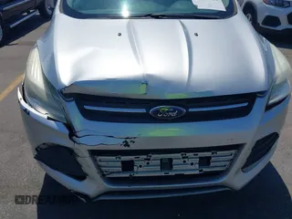 2013 Ford Escape SE with VIN 1FMCU0GX0DUA19811, listed as a IAAI auction lot 42009015 with 135,662 mi miles. Bid and sale history available at carsss.com. Image 6.