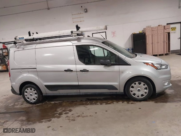 2023 Ford Transit Connect Van XLT with VIN NM0LS7T22P1557989, listed as a IAAI auction lot 41606146 with 6,554 mi miles. Bid and sale history available at carsss.com. Image 12.