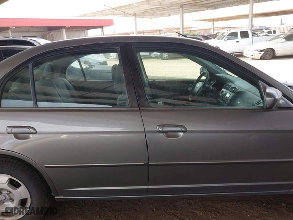 2004 Honda Civic Hybrid with VIN JHMES95654S018200, listed as a IAAI auction lot 41912912 with 291,301 mi miles. Bid and sale history available at carsss.com. Image 13.