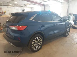 2022 Ford Escape Titanium Hybrid z VIN 1FMCU9DZ9NUA38627, wystawiony jako IAAI lot #42288647 z przebiegiem 54 802 mil mil oraz . Historia ofert i sprzedaży dostępna na DreamBid. Obrazek 4.