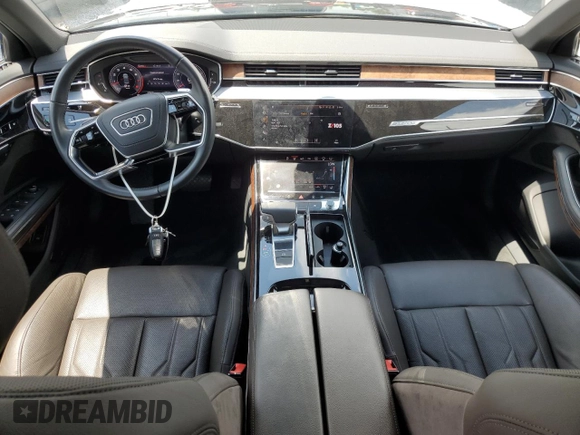 2019 Audi A8 with VIN WAU8DAF89KN011642, listed as a Copart auction lot 57915325 with 27,018 mi miles and Salvage title. Bid and sale history available at DreamBid. Image 8.
