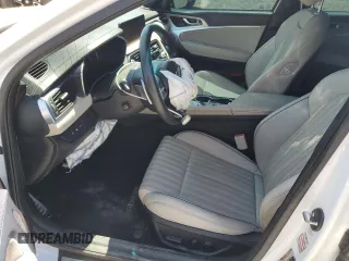 2023 Genesis G70 2.0T z VIN KMTG34TA2PU121330, wystawiony jako Copart lot #55718144 z przebiegiem 19 599 mil mil oraz Szkoda całkowita • Salvage title. Historia ofert i sprzedaży dostępna na DreamBid. Obrazek 7.
