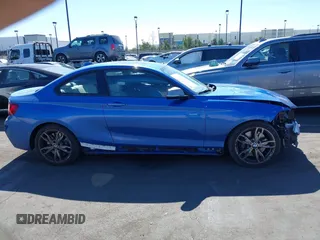 2015 BMW 2 Series M235i with VIN WBA1J7C59FV254140, listed as a IAAI auction lot 41642427 with 23,957 mi miles and . Bid and sale history available at carsss.com. Image 14.