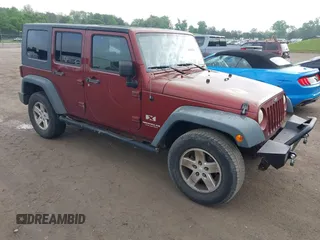 2008 Jeep Wrangler Unlimited X with VIN 1J4GA39108L606685, listed as a IAAI auction lot 41965538 with 288,946 mi miles. Bid and sale history available at carsss.com. Image 1.