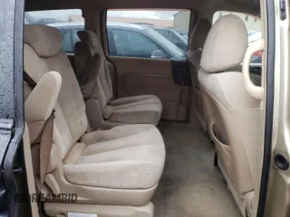 2007 Kia Sedona EX with VIN KNDMB233776121810, listed as a Copart auction lot 77229344 with 133,193 mi miles and Salvage Title. Bid and sale history available at carsss.com. Image 11.