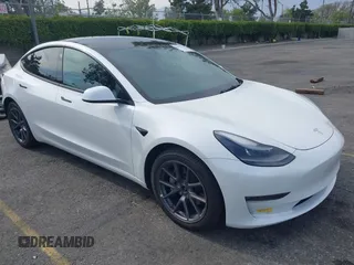 2021 Tesla Model 3 Long Range with VIN 5YJ3E1EB7MF089524, listed as a IAAI auction lot 42023474 with 19,757 mi miles. Bid and sale history available at carsss.com. Image 1.