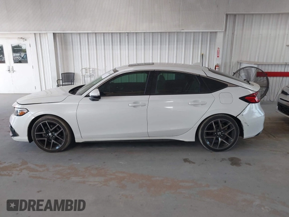 2022 Honda Civic Sport Touring z VIN 19XFL1H8XNE016822, wystawiony jako IAAI lot #42113420 z przebiegiem 30 361 mil mil oraz . Historia ofert i sprzedaży dostępna na DreamBid. Obrazek 14.