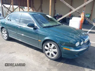 2004 Jaguar X-Type with VIN SAJEA51C24WD81320, listed as a IAAI auction lot 41717921 with 71,859 mi miles. Bid and sale history available at carsss.com. Image 1.