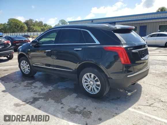 2019 Cadillac XT5 FWD with VIN 1GYKNARS9KZ219259, listed as a Copart auction lot 56900625 with 58,739 mi miles and Non repairable. Bid and sale history available at DreamBid. Image 2.