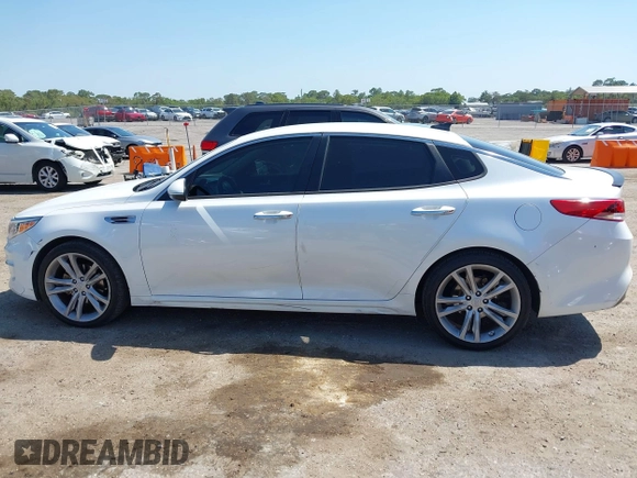 2016 Kia Optima LX with VIN KNAGT4L32G5085128, listed as a IAAI auction lot 42016728 with 259,218 mi miles. Bid and sale history available at carsss.com. Image 14.