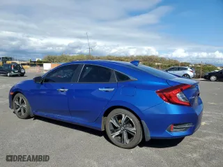 2017 Honda Civic Sedan Touring with VIN 19XFC1F97HE029141, listed as a Copart auction lot 44219085 with 101,799 mi miles and Salvage Title. Bid and sale history available at carsss.com. Image 2.