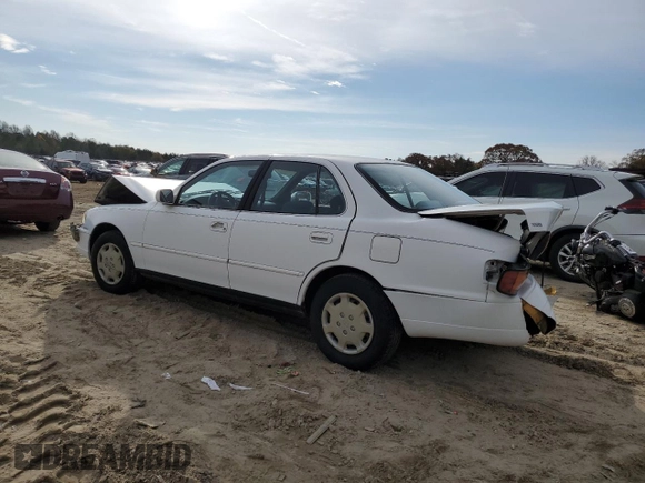 1992 Toyota Camry LE with VIN 4T1SK12E9NU084641, listed as a Copart auction lot 80623414 with 87,846 mi miles and Salvage Title. Bid and sale history available at carsss.com. Image 2.