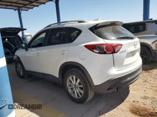 2015 Mazda CX-5 Touring with VIN JM3KE2CY2F0478167, listed as a Copart auction lot 52772805 with 135,492 mi miles and Salvage Title. Bid and sale history available at carsss.com. Image 2.