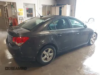 2014 Chevrolet Cruze 1LT with VIN 1G1PC5SBXE7477219, listed as a IAAI auction lot 41970786 with 194,542 mi miles and . Bid and sale history available at DreamBid. Image 4.