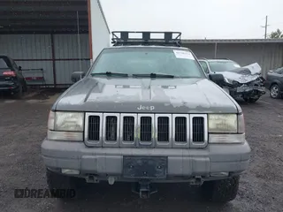 1997 Jeep Grand Cherokee Laredo with VIN 1J4GZ58Y8VC624804, listed as a IAAI auction lot 41736324 with 165,851 mi miles. Bid and sale history available at carsss.com. Image 6.
