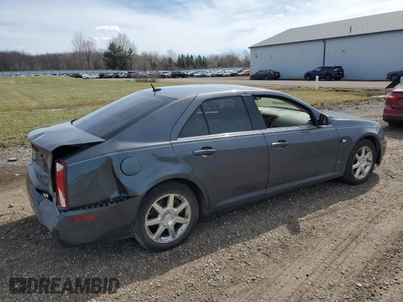 2007 Cadillac STS z VIN 1G6DW677970160672, wystawiony jako Copart lot #50568525 z przebiegiem 127 699 mil mil oraz Szkody całkowita. Historia ofert i sprzedaży dostępna na DreamBid. Obrazek 3.