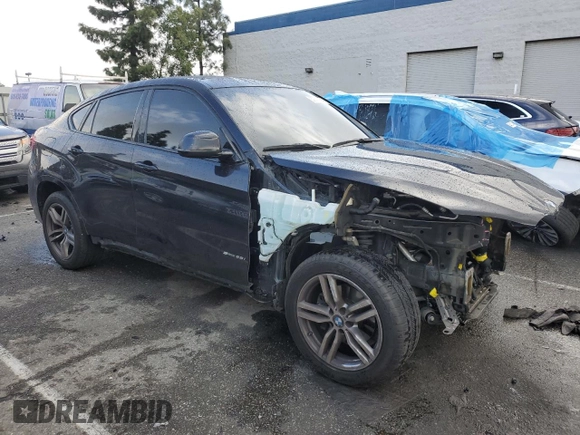 2016 BMW X6 sDrive35i with VIN 5UXKU0C54G0F93393, listed as a Copart auction lot 39393874 with 103,254 mi miles and . Bid and sale history available at DreamBid. Image 4.