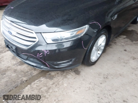 2015 Ford Taurus SEL z VIN 1FAHP2E87FG203272, wystawiony jako IAAI lot #41717231 z przebiegiem 95 829 mil mil oraz . Historia ofert i sprzedaży dostępna na DreamBid. Obrazek 6.