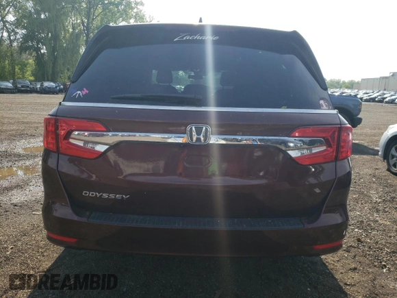 2018 Honda Odyssey EX with VIN 5FNRL6H55JB037386, listed as a Copart auction lot 63577475 with 125,498 mi miles and Salvage title. Bid and sale history available at DreamBid. Image 6.