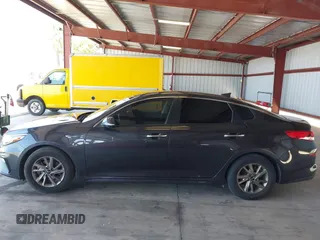 2019 Kia Optima LX with VIN 5XXGT4L31KG324949, listed as a IAAI auction lot 42468112 with 153,404 mi miles and . Bid and sale history available at DreamBid. Image 14.