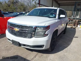 2018 Chevrolet Tahoe Commercial with VIN 1GNLCDEC0JR283440, listed as a IAAI auction lot 41280493 with 241,531 mi miles. Bid and sale history available at carsss.com. Image 17.