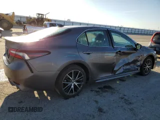 2023 Toyota Camry SE with VIN 4T1G11AK3PU769155, listed as a Copart auction lot 49654825 with 18,505 mi miles and Salvage Title. Bid and sale history available at DreamBid. Image 3.