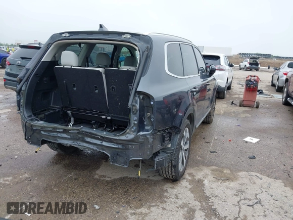 2022 Kia Telluride EX with VIN 5XYP34HC0NG195434, listed as a IAAI auction lot 42171838 with 52,506 mi miles and . Bid and sale history available at DreamBid. Image 4.