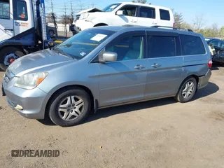 2006 Honda Odyssey EX-L with VIN 5FNRL38696B077792, listed as a IAAI auction lot 42048793 with 149,868 mi miles and . Bid and sale history available at carsss.com. Image 2.
