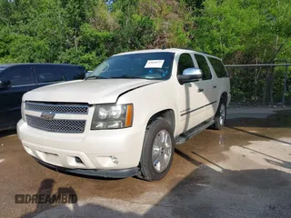 2010 Chevrolet Suburban LTZ with VIN 1GNUKKE38AR251895, listed as a IAAI auction lot 42020123 with 166,130 mi miles. Bid and sale history available at carsss.com. Image 17.